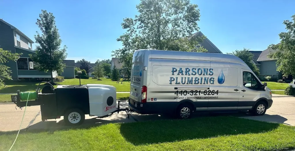 parsons plumbing van on a sunny day
